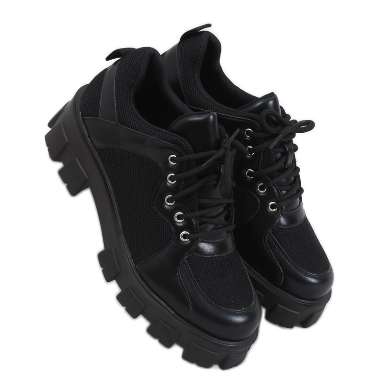 Mustat mokkasiinit korkealla pohjalla NC1129 Musta