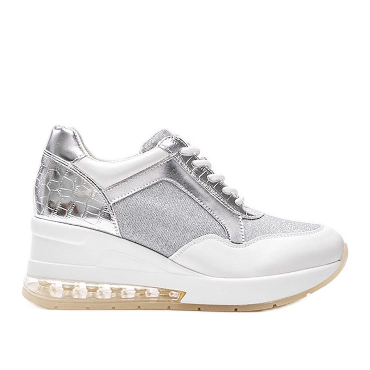 Valkoiset ja hopeiset lenkkarit Jimenan kiilassa valkoinen