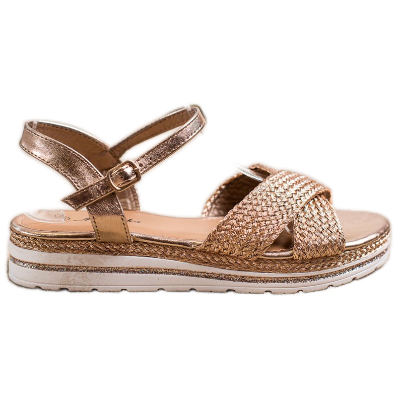 Mannika Kultaiset sandaalit alustalla kultainen