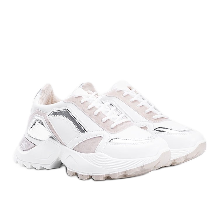 Gordani -beige -lenkkarit, joissa metallinen lisäosa