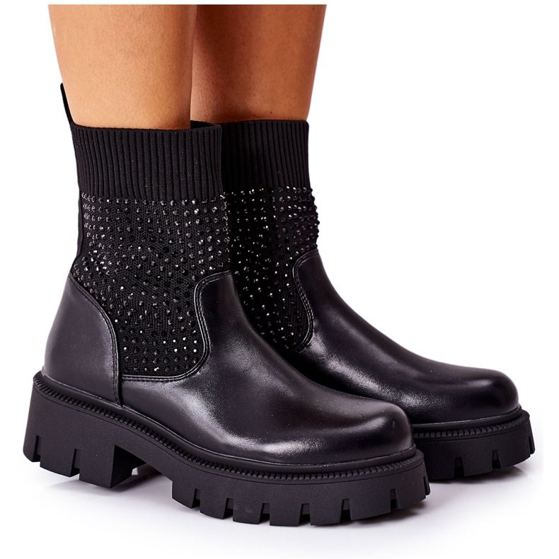 Mustat Xoxo -työntekijät, jotka on valmistettu joustavasta kankaasta, jossa on kuutiometriä