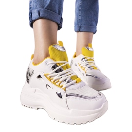 Valkoiset ja keltaiset Felicia -käärme -lenkkarit valkoinen keltainen