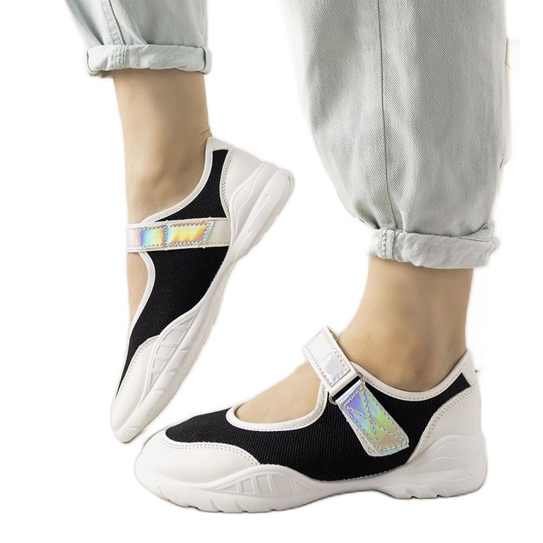 Mustavalkoiset lenkkarit holografisella Melania -insertillä valkoinen