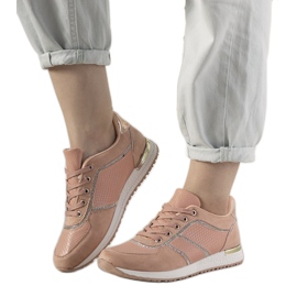 Vaaleanpunaiset Ecoma -lenkkarit, joissa on käärmeen iho vaaleanpunainen