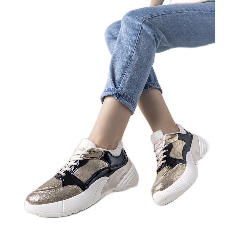 Kultaiset lenkkarit korkealla pohjalla Rude musta