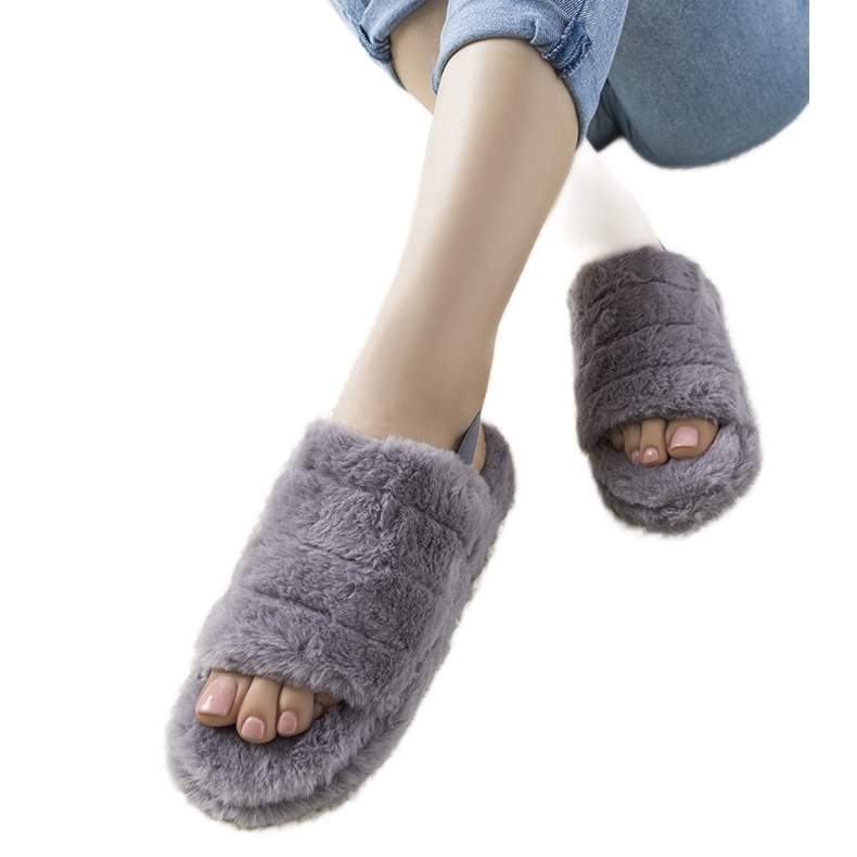 Harmaat naisten tossut, joissa kuminauha ja Fierro -turkis