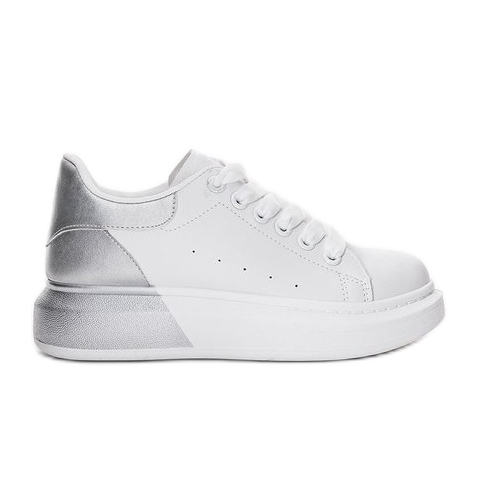 Valkoiset tennarit, joissa hopea Run -päällinen valkoinen