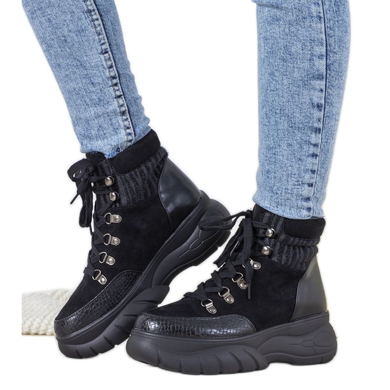 Mustat talvikengät Miron animal -teemalla