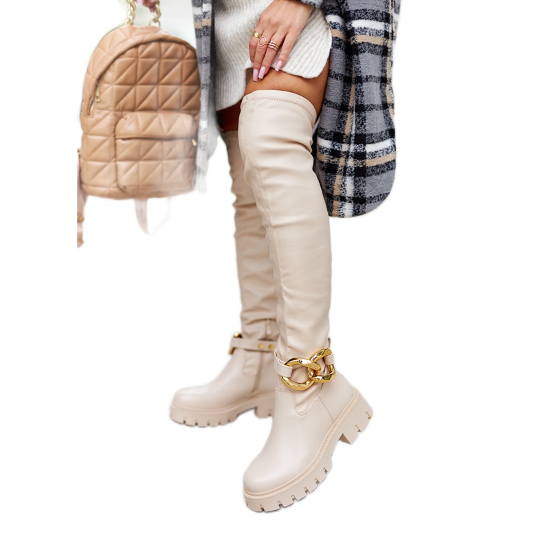 Korkeat saappaat koristeellisella beigellä Masha -elementillä