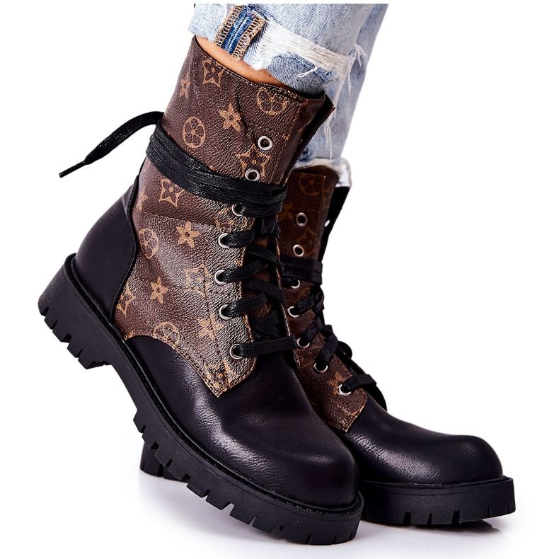 FJ1 Lonevis ruskeat ja mustat nahkasaappaat