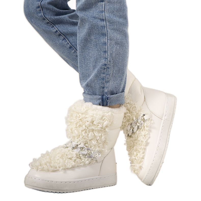 Montminan valkoiset turkissaappaat valkoinen