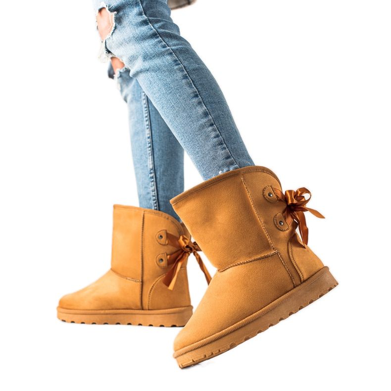 TRENDI Mukluki jousella keltainen