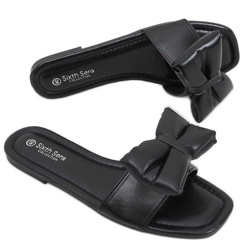 Mili Mustat tossut rusetilla