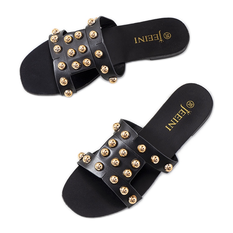 Mustat tossut koristeellisilla Amparo-nastoilla