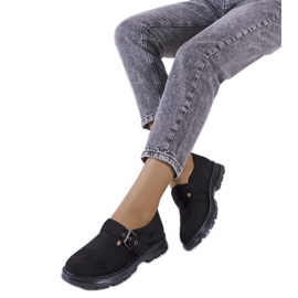 Mustat broguet Ancel-soljella