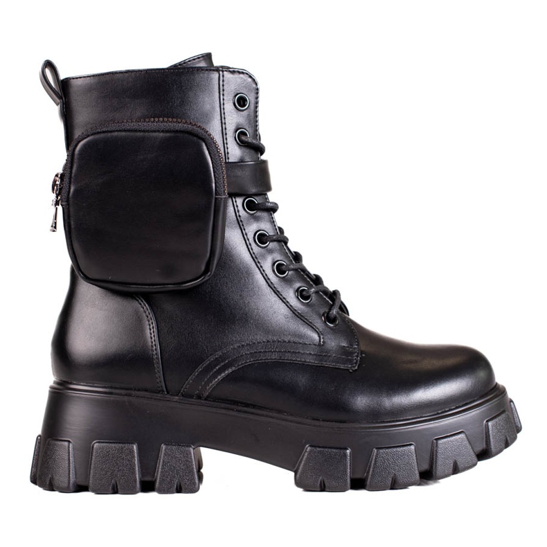 Mustat naisten nauhoitustyöläiset laukun kanssa