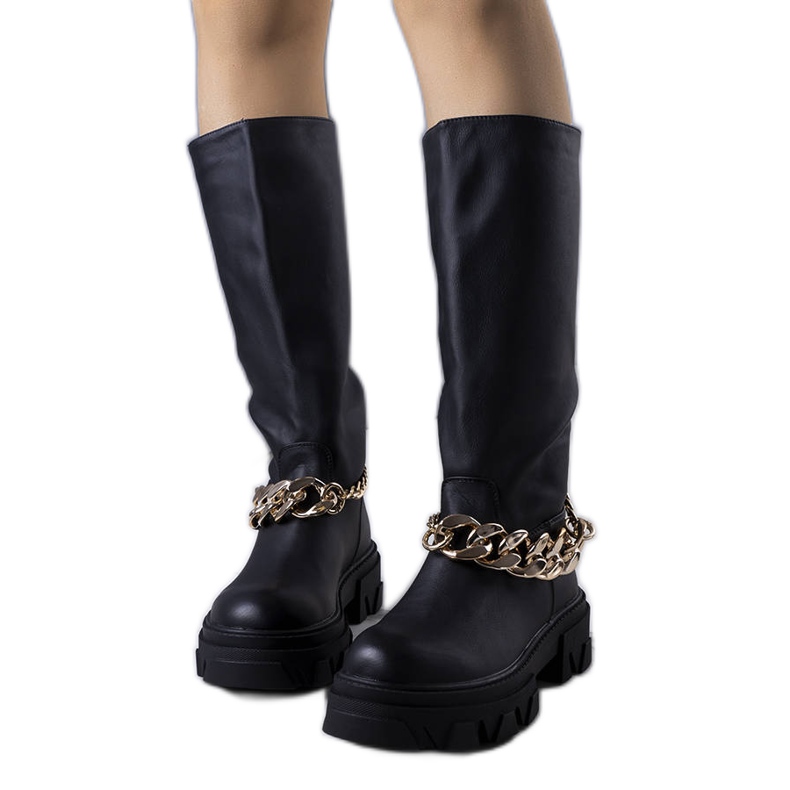 Mustat eristetyt Cumian saappaat