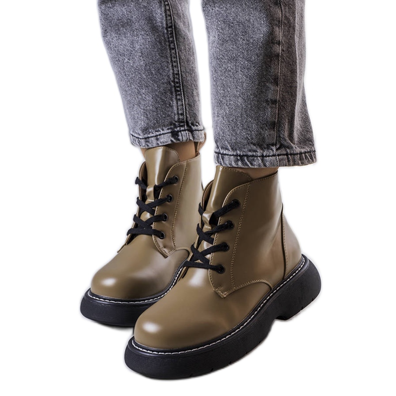 Luteron vihreät eristetyt saappaat