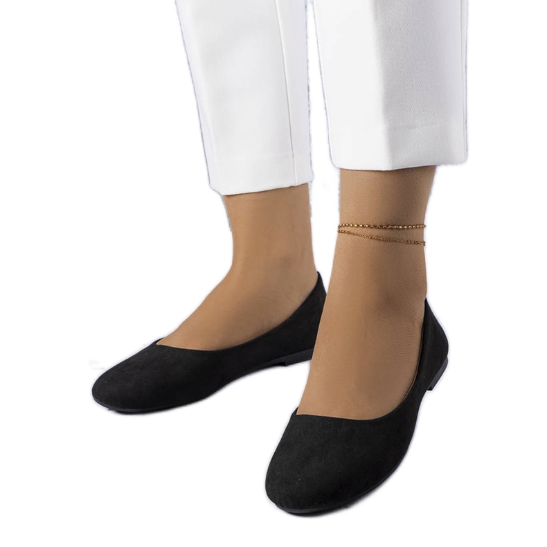 Lespérancen mustat asusteet, joissa nahkainen pohjallinen