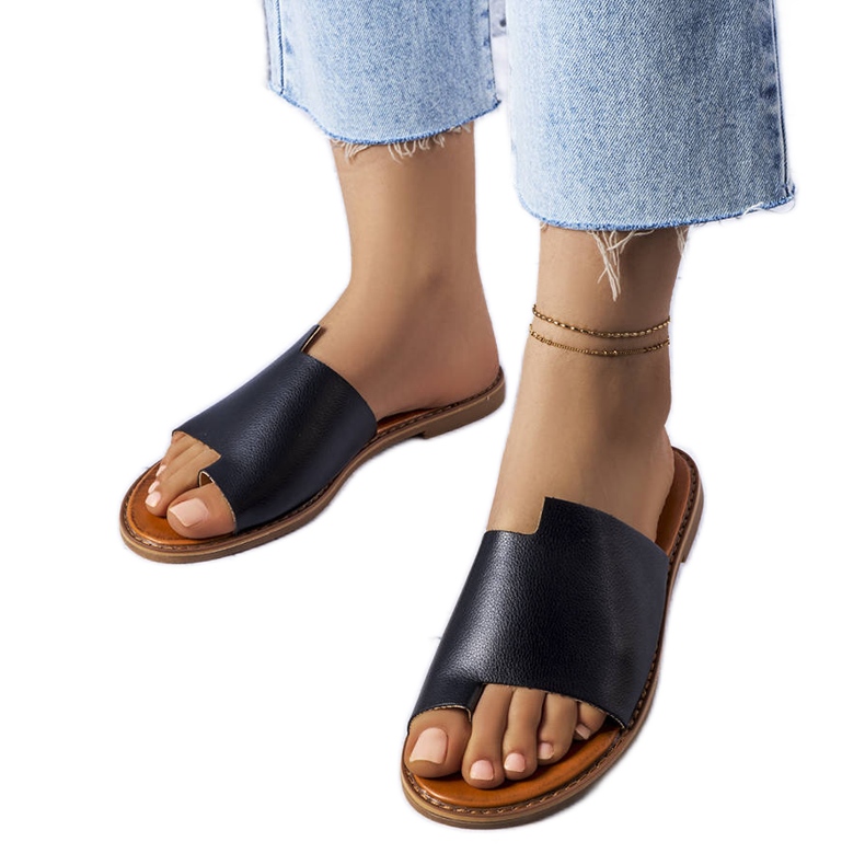 Latourelle mustat tossut, joissa epäsäännöllinen päällinen