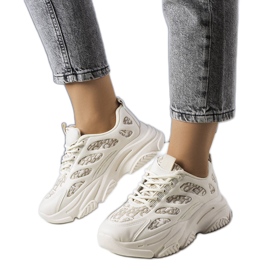 Beiget tennarit, joissa on Kara-printti