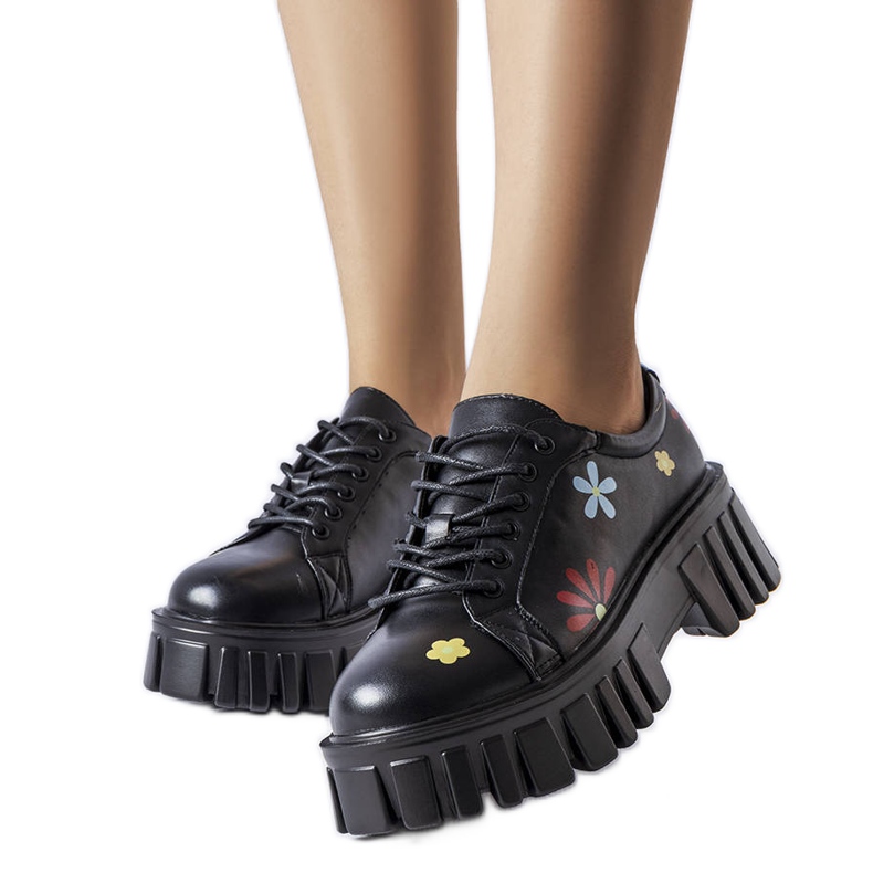 Mustat broguet koristeltu Gemini-kukilla