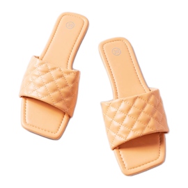 Labrien oranssit tikatut tossut