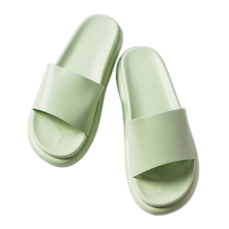 Vihreät tossut Paquette-alustalla