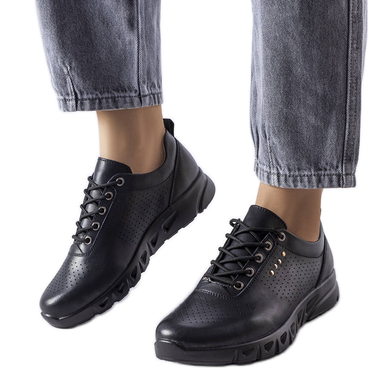 Brodeurin mustat harjakattoiset nahkaiset broguet