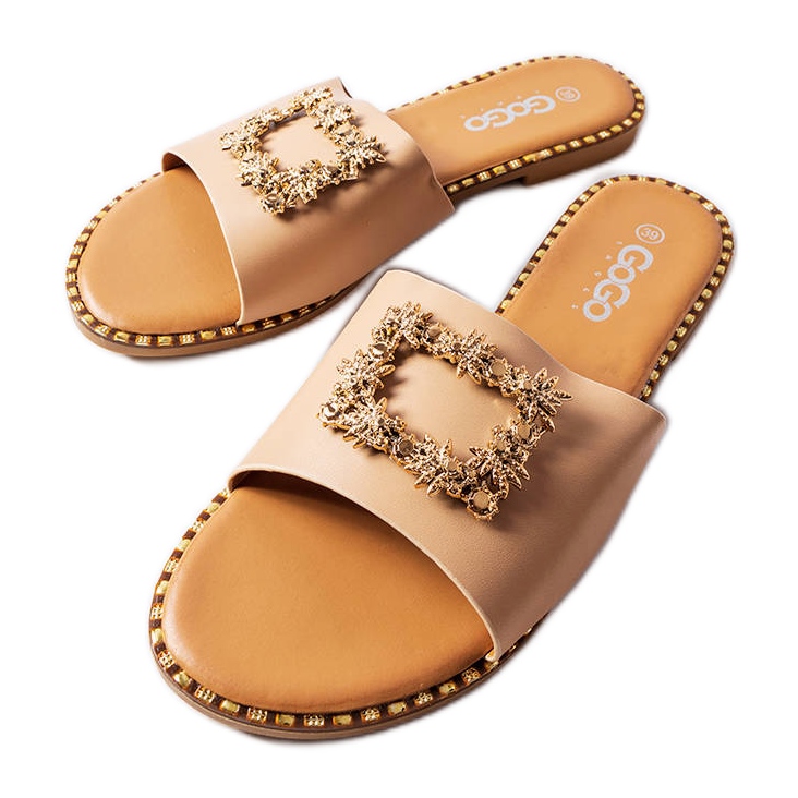 Miriaman beigenväriset liukusäätimet koristeilla