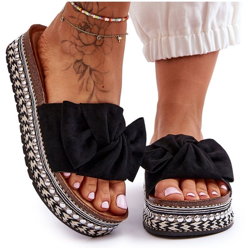 Naisten mokkanahkaiset tossut, joissa rusetti musta Lauria