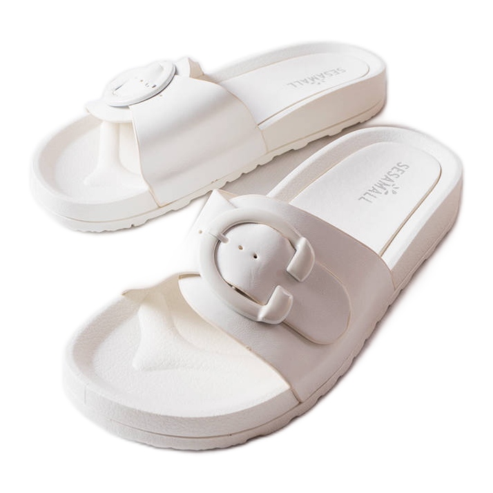 Inna Généreux'n valkoiset soljelliset liukusäätimet valkoinen