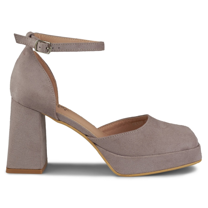 Pumput leveässä kantapäässä, joka kiinnitetään nilkasta harmaa