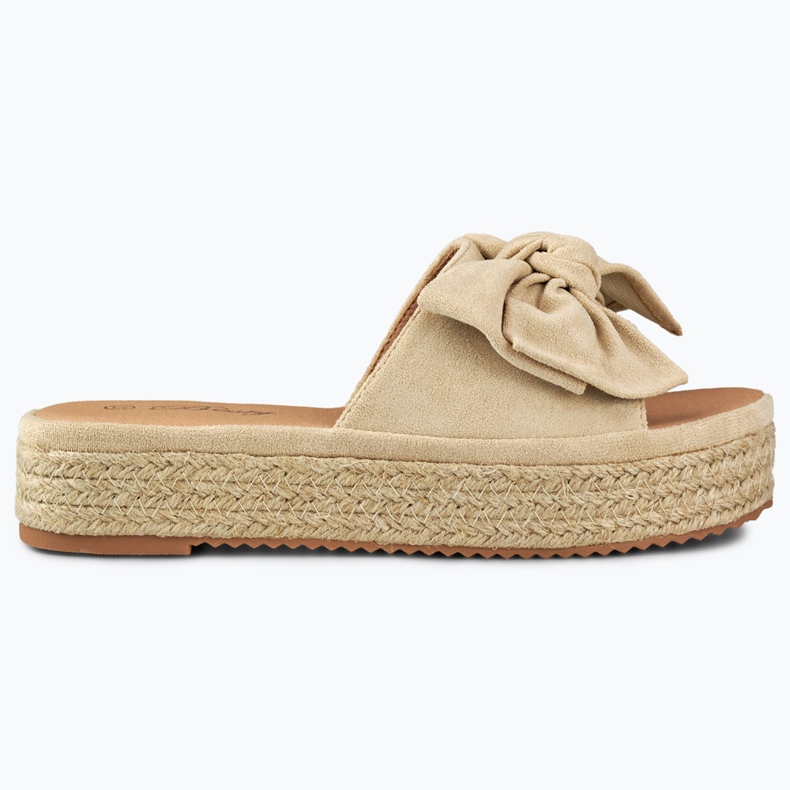 Beiget espadrillit rusetilla