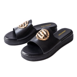 Michellen mustat alustasandaalit