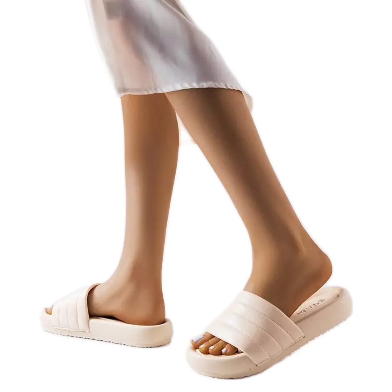 Skillenin beigenväriset rennot tossut