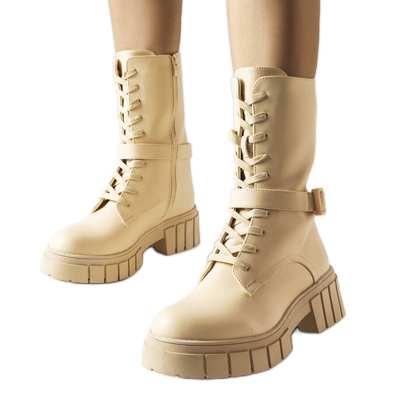 Riven beigenväriset työsaappaat