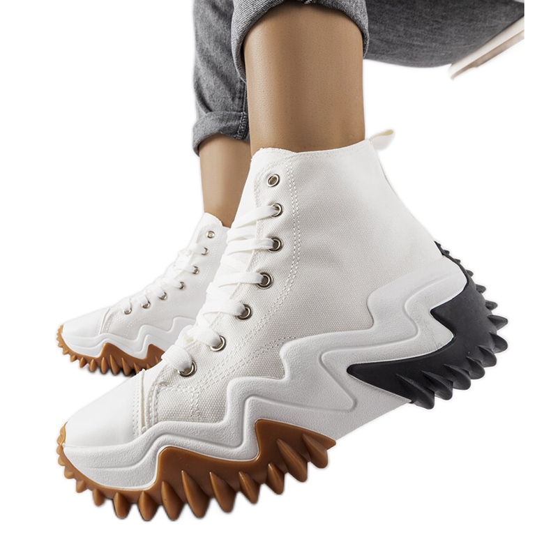 Toron valkoiset urheilulenkkarit paksulla pohjalla valkoinen