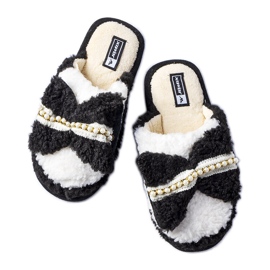 Mustavalkoiset tossut rusetilla