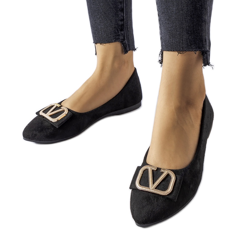 Mustat balettihousut koristeellisella Secondo-soljella