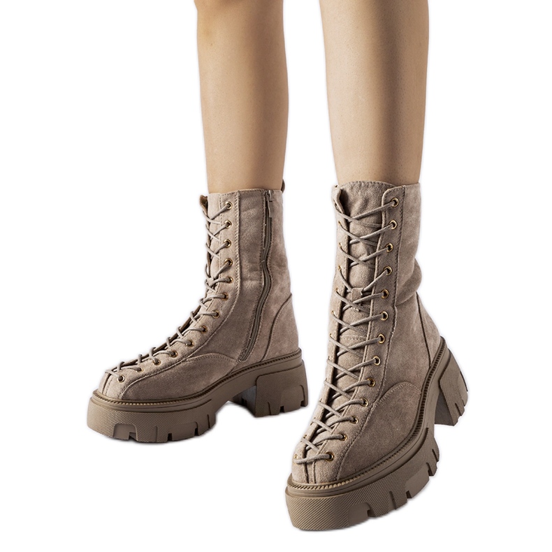 Ruskeat saappaat koristeltu Amol-sidoksella