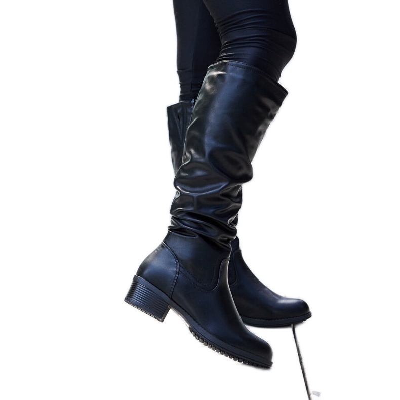 Mustat ryppyiset Angelico-saappaat