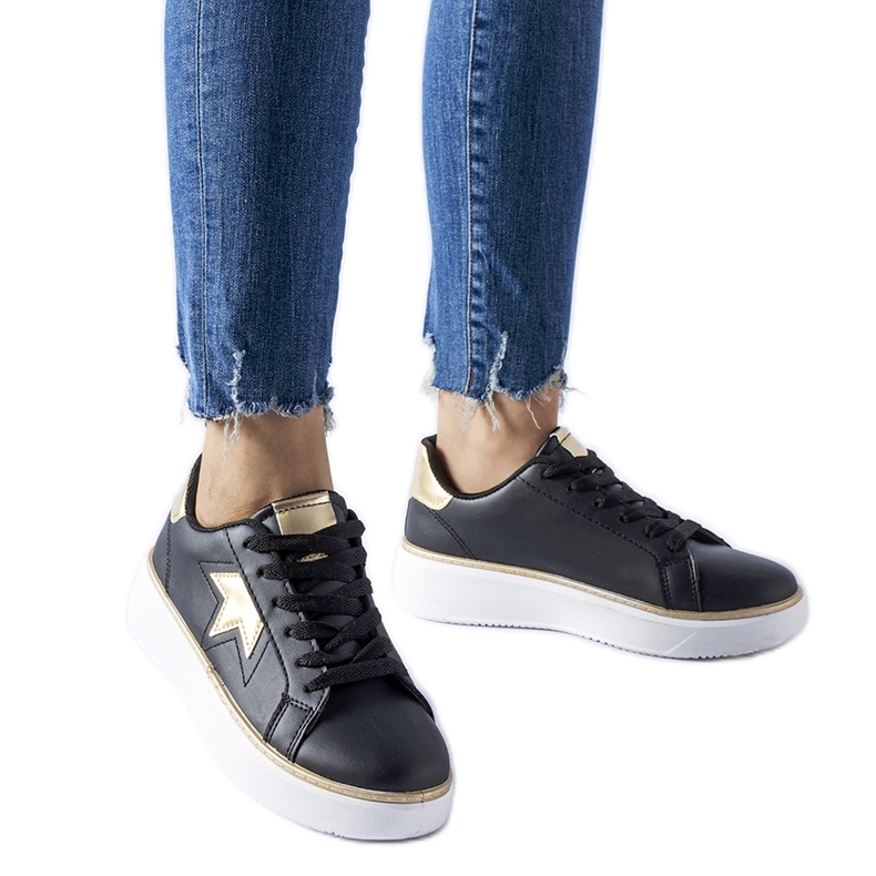 Mustat ja kultaiset Fraggle-urheilulenkkarit