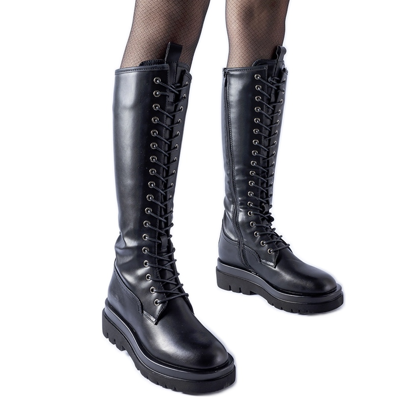 Mustat pitkäeristetyt Padernello-työläiset