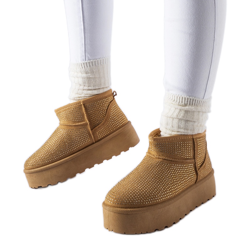 Ruskeat lumisaappaat Sonoran strassit