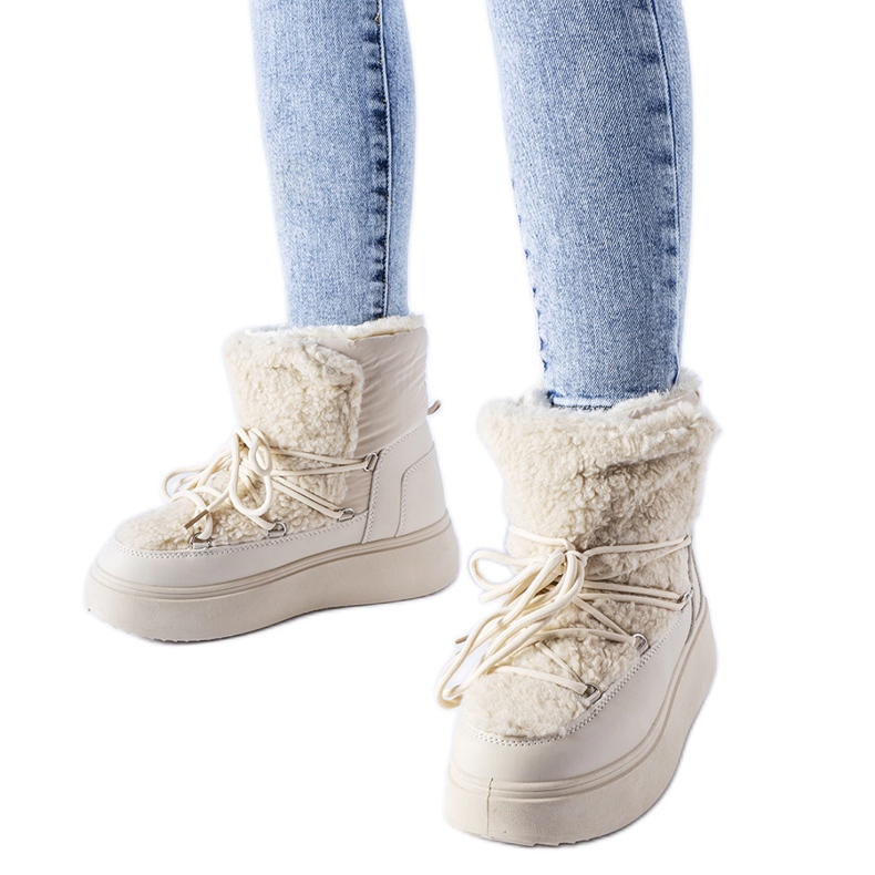 Beiget lumisaappaat massiivisella Elvio-tasolla