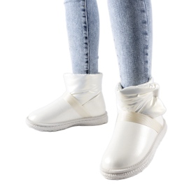 Delaunen beigenväriset kiiltävät lyhyet lumisaappaat