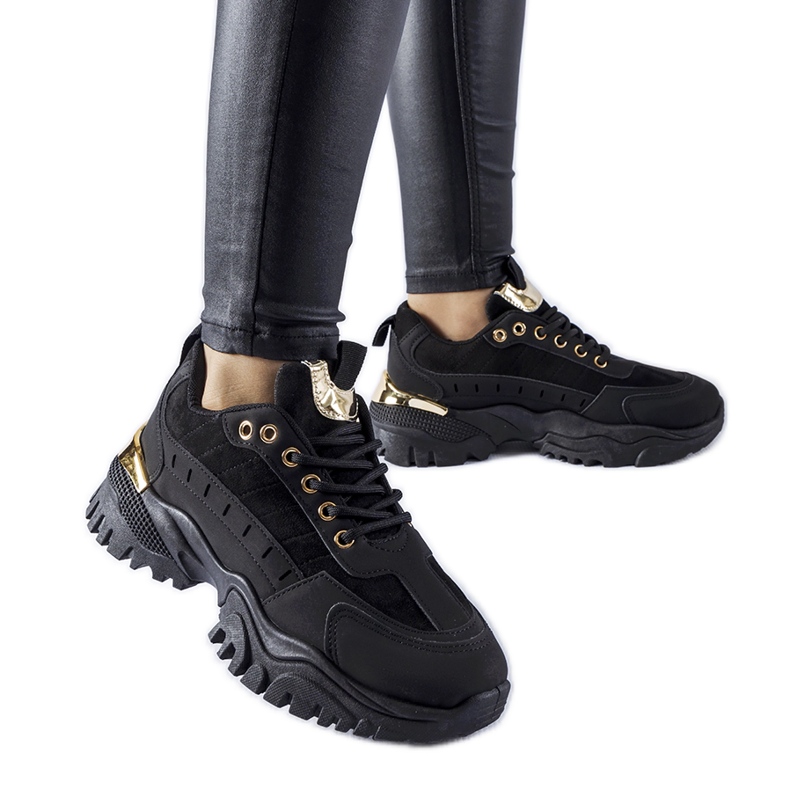 Laudes mustat urheilulenkkarit