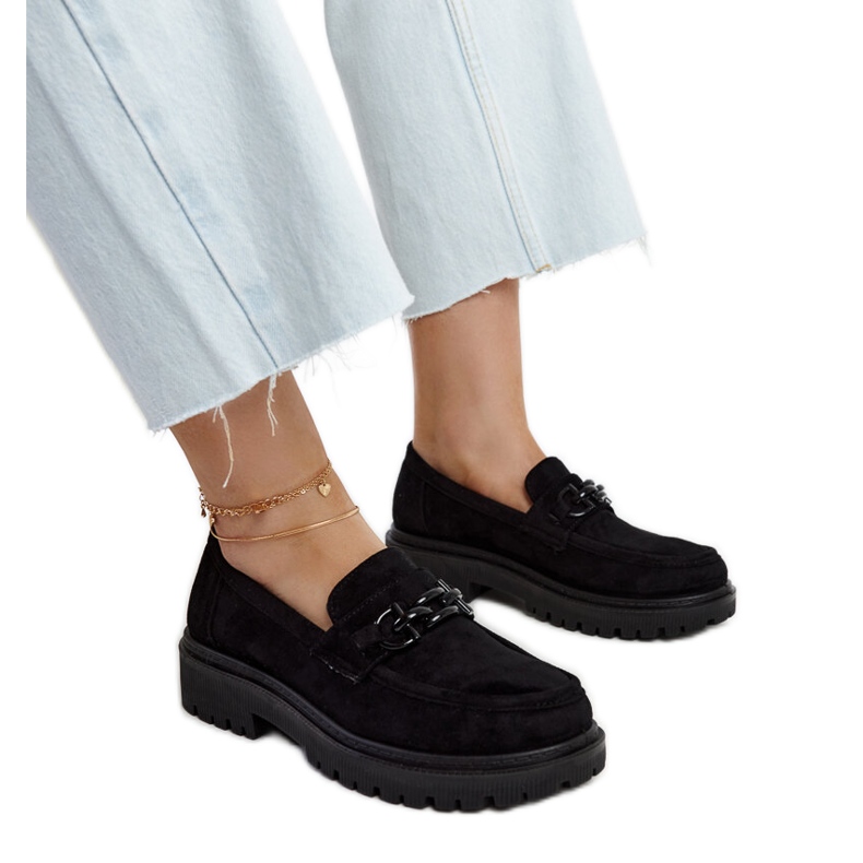 Mustat mokkanahkaat, joissa Lyle-solki