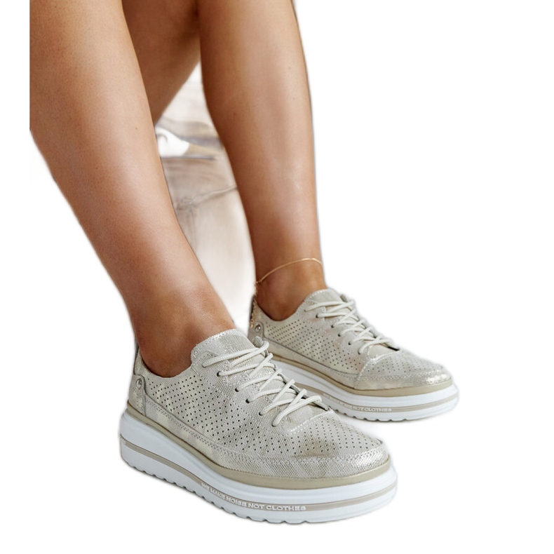 Pianokultaiset nahkaiset kiilalenkkarit kultainen